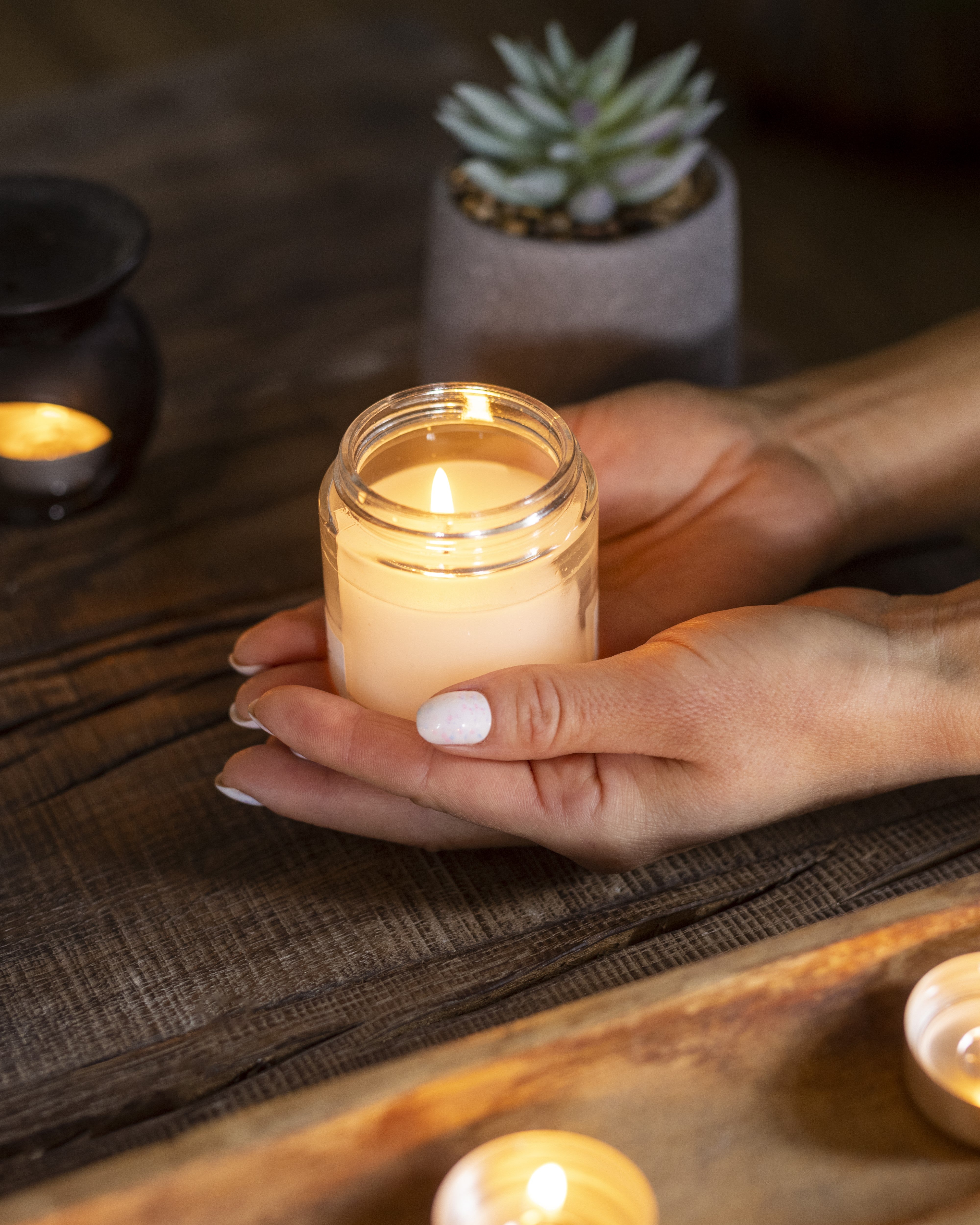 high-angle-woman-holding-candle.jpg